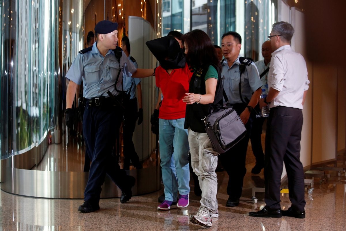 Hong Kong park shooting: Female bodyguard charged with murder