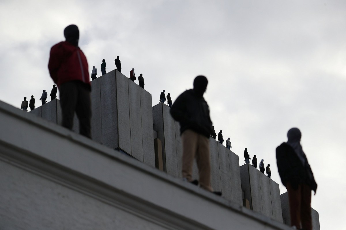 This is an art installation on top of a roof in London by US sculptor Mark Jenkins.