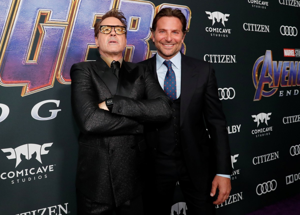 Robert Downey Jr. (Iron Man) and Bradley Cooper (Rocket Racoon)