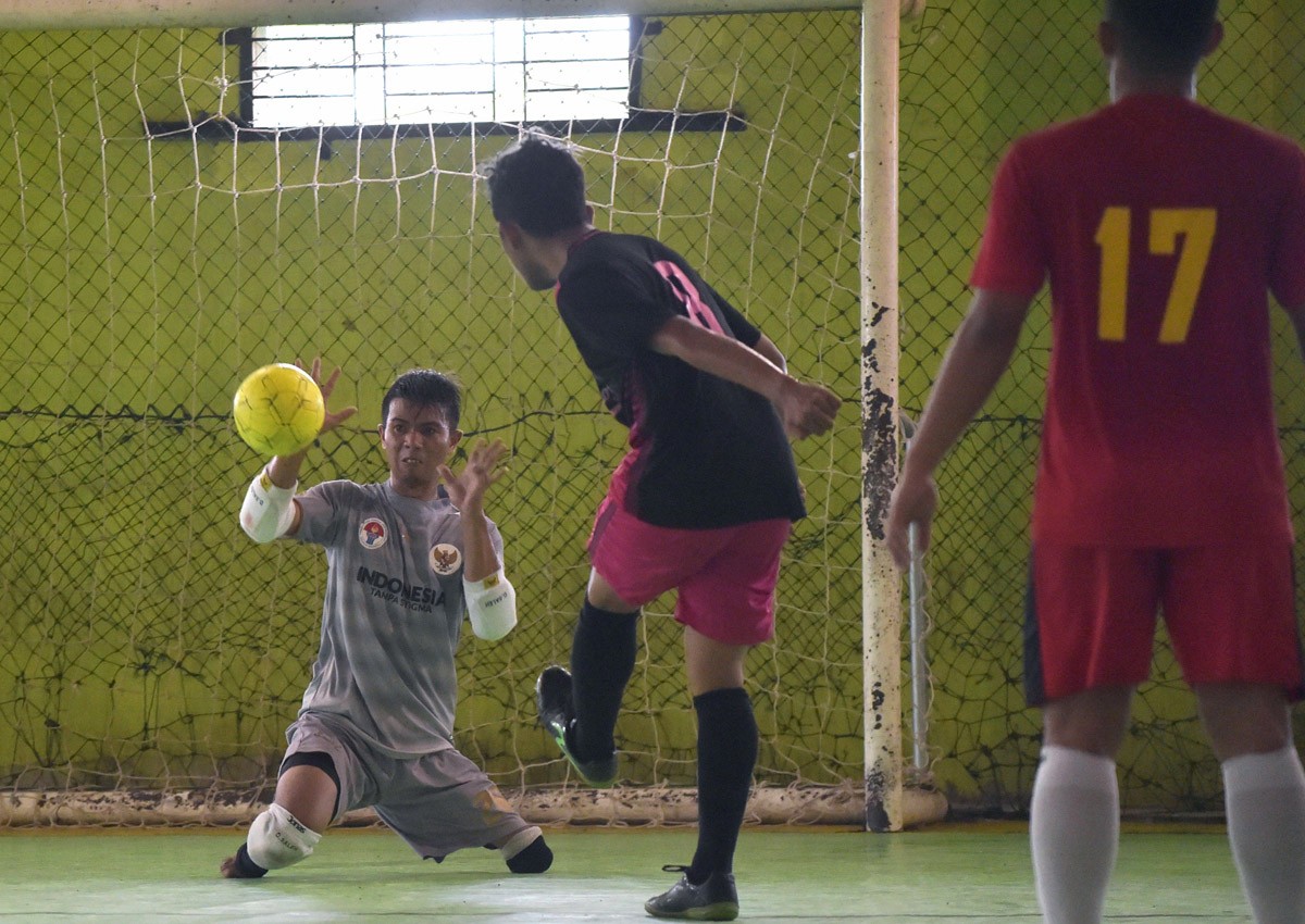 Indonesia's footless goalkeeper kicks home powerful message