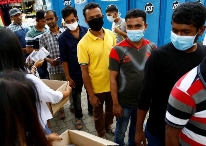 Woman orders $100 worth of food for foreign workers stuck in Punggol dormitory. Here's how you can help others like them