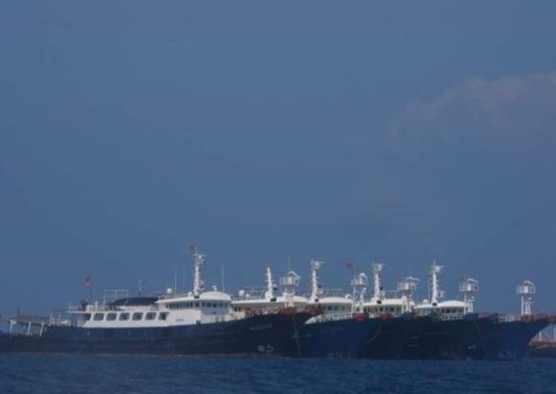 Philippines turns up heat on China over boats massing in South China Sea