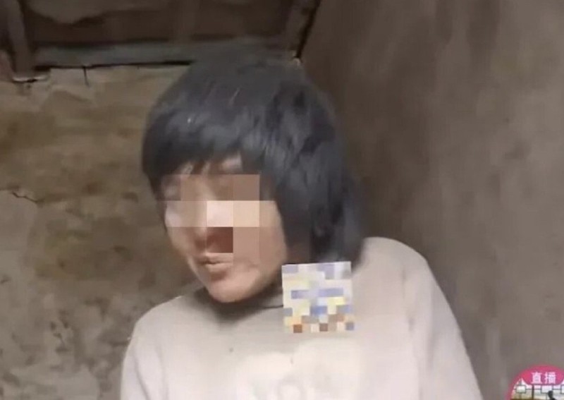 China jails 6 for up to 11 years in case of chained mentally-ill woman