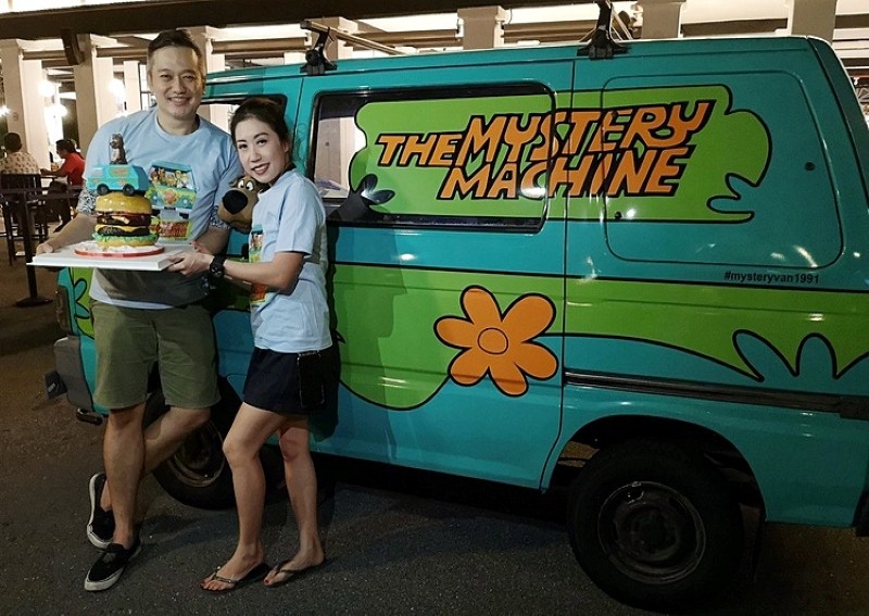 In the passenger seat: Clarence Tan, owner of Singapore's Mystery Machine