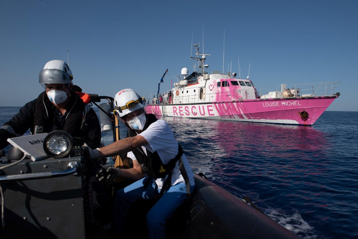 Italy sends help to Banksy's overloaded migrant rescue boat
