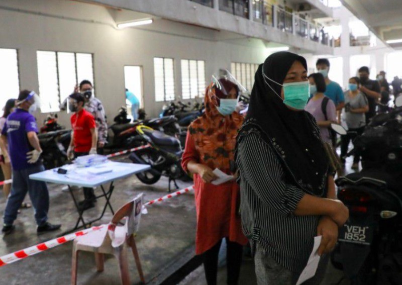 Malaysia to ease Covid-19 curbs for fully vaccinated in 8 states