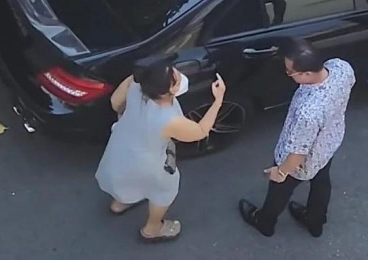 'Someone hit me': Woman tries to stop car with body in Geylang