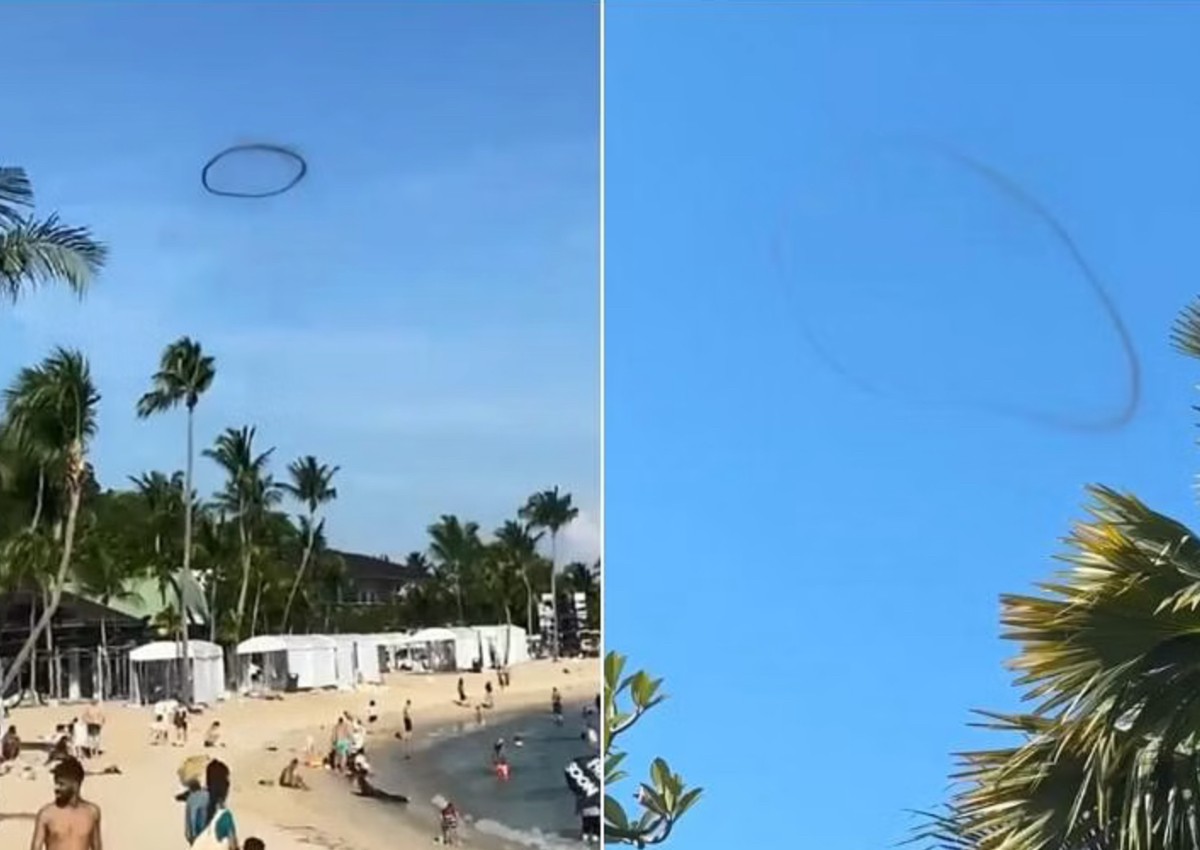 'We thought it was a swarm of bees': Mysterious ring of smoke seen in the sky at Sentosa puzzles onlookers