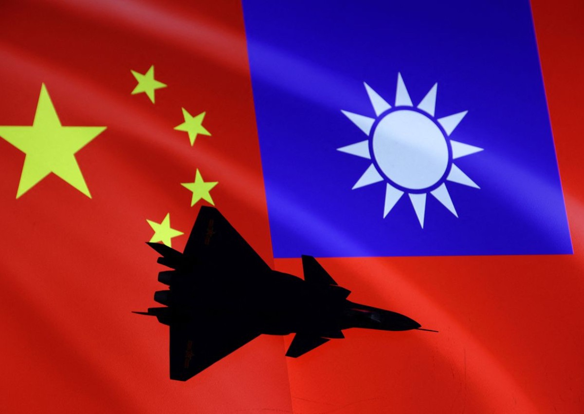 Taiwan warns of surge in tensions as Chinese planes cross median line