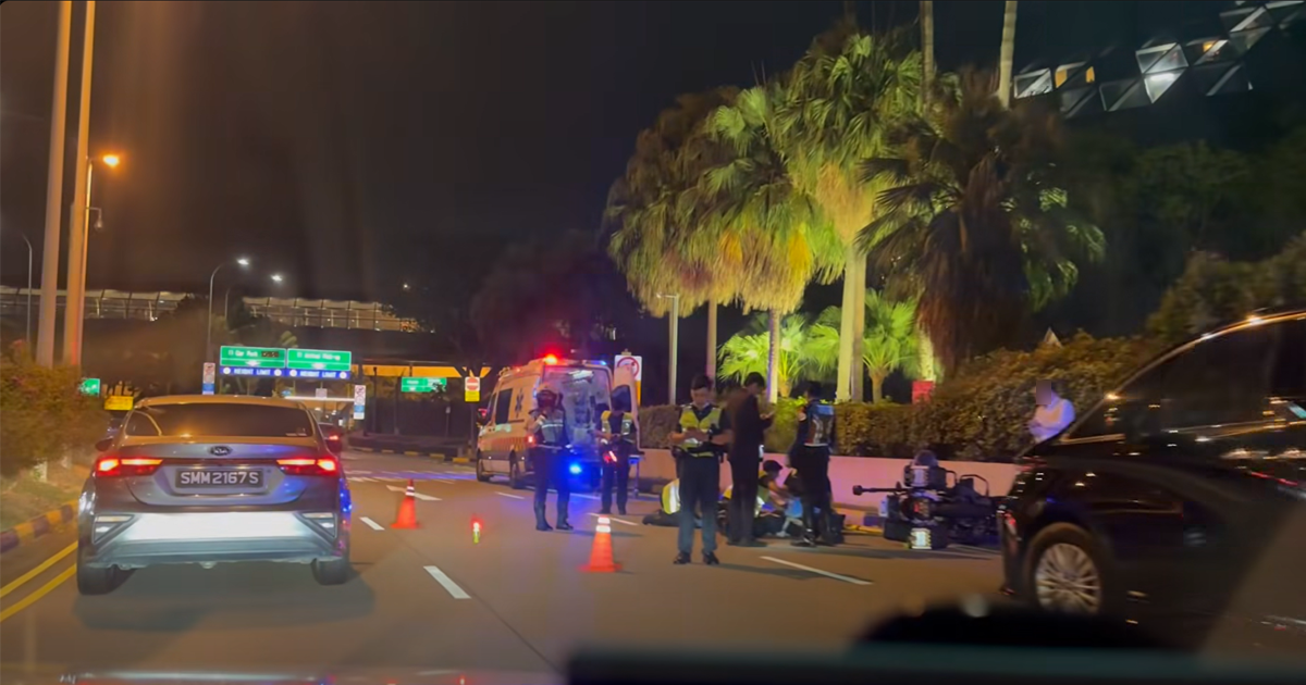 Limo taxi rear-ends auxiliary police outrider at Changi Airport; officer hospitalized with elbow fractures, driver assists police probe