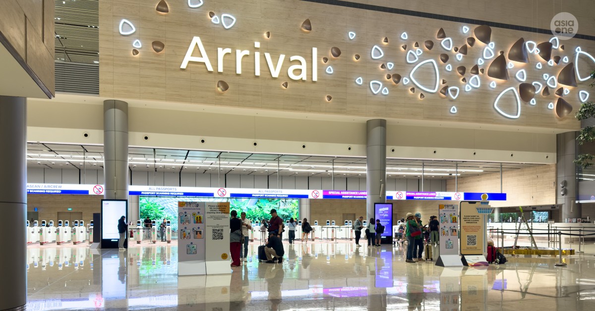 Man who fled Singapore on fishing boat over 20 years ago to avoid jail is caught at Changi Airport after returning under a false identity