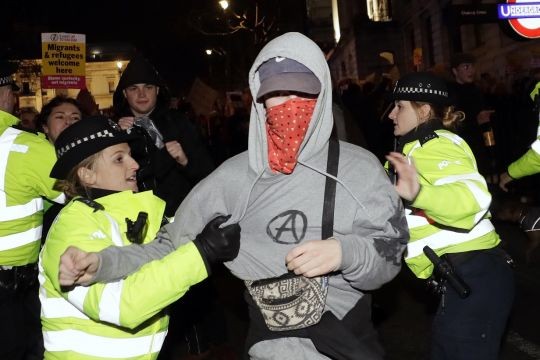 'Not my prime minister', protesters march in London against Boris Johnson