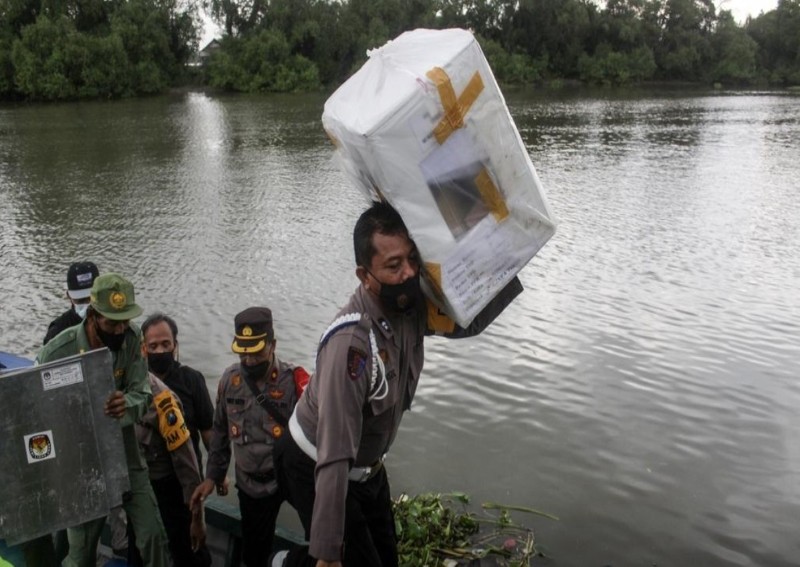 Indonesia holds regional polls under shadow of rising Covid-19 cases