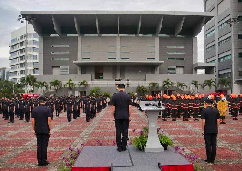 Edward Go posthumously promoted to Sgt as SCDF rings fire call across Singapore to honour fallen brother