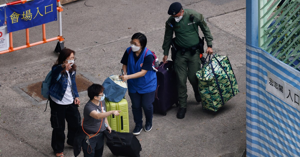 A week after Hong Kong's deadly fire, some residents return for belongings
