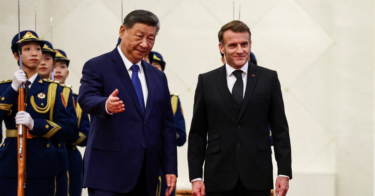 Flanked by business leaders, Macron meets Xi as EU prepares tougher trade rules