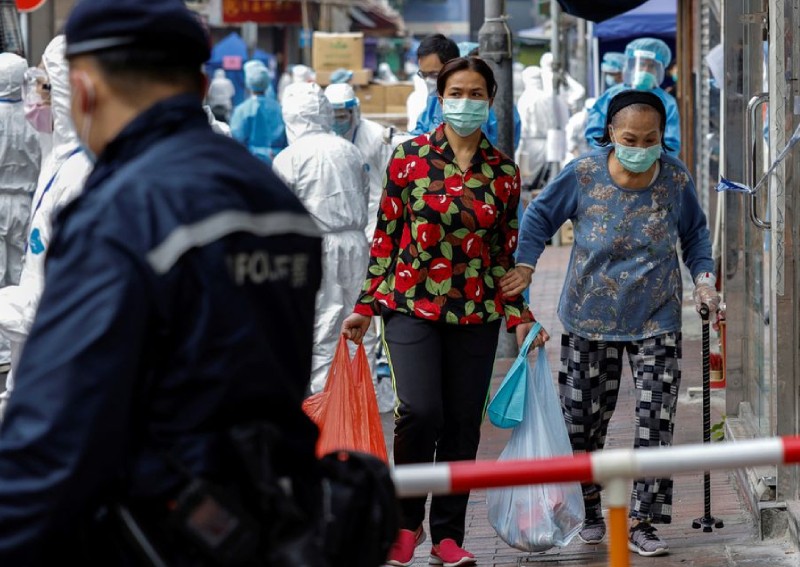 Hong Kong's zero-Covid strategy under pressure as cases soar