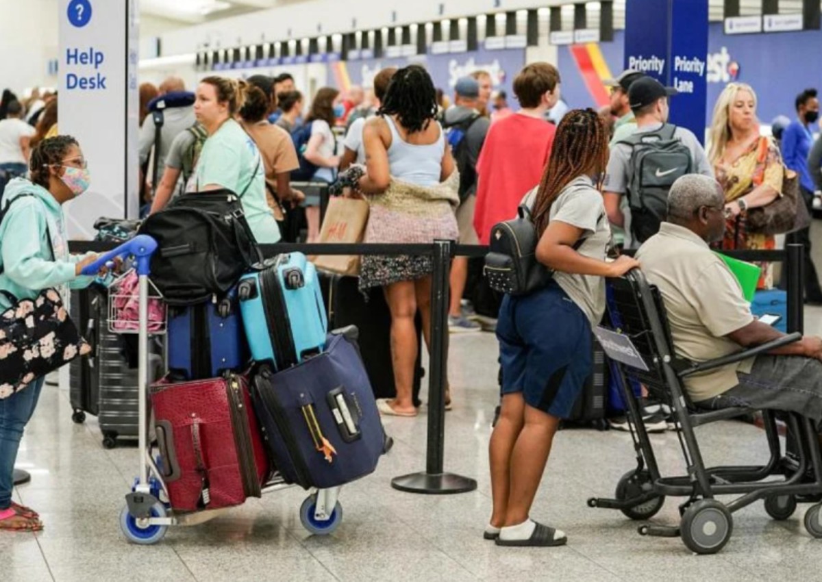 Airlines can't charge families for wanting to sit together on planes, says Biden