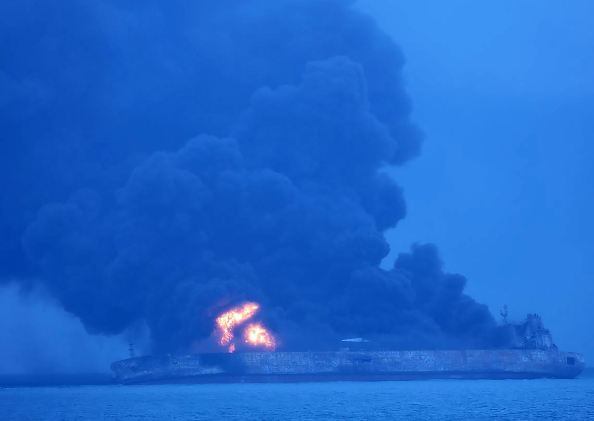 Tanker ablaze, 32 missing after collision off China