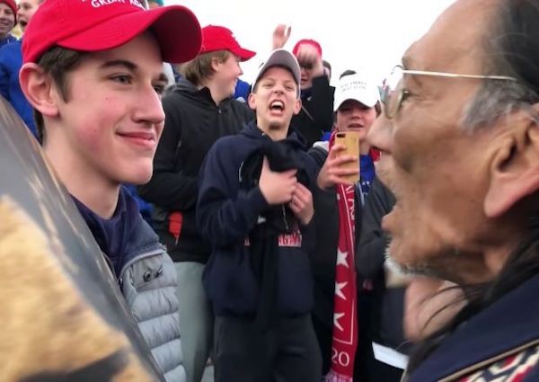 Student in Trump hat denies mocking Native American activist in videotaped encounter