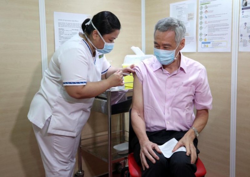 Quick and painless, says PM Lee as he completes Covid-19 vaccination regimen