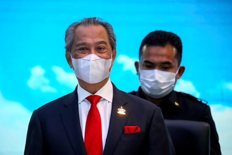 Malaysia's PM Muhyiddin denies cancer rumours amid power struggle