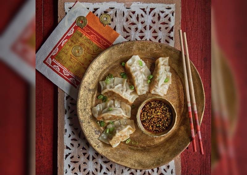 Oops: Kim zua, funeral envelope featured by established British media in CNY food photos