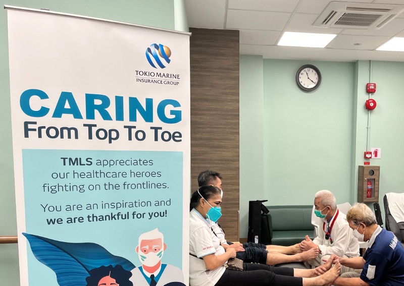 Tokio Marine Life Insurance Singapore shows care for nursing professionals of Home Nursing Foundation with mobile massage treat delivered by Singapore Association of the Visually Handicapped