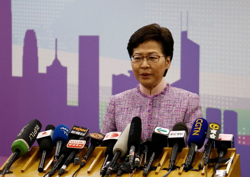 Hong Kong leader says she cannot accept claims press freedom faces 'extinction'