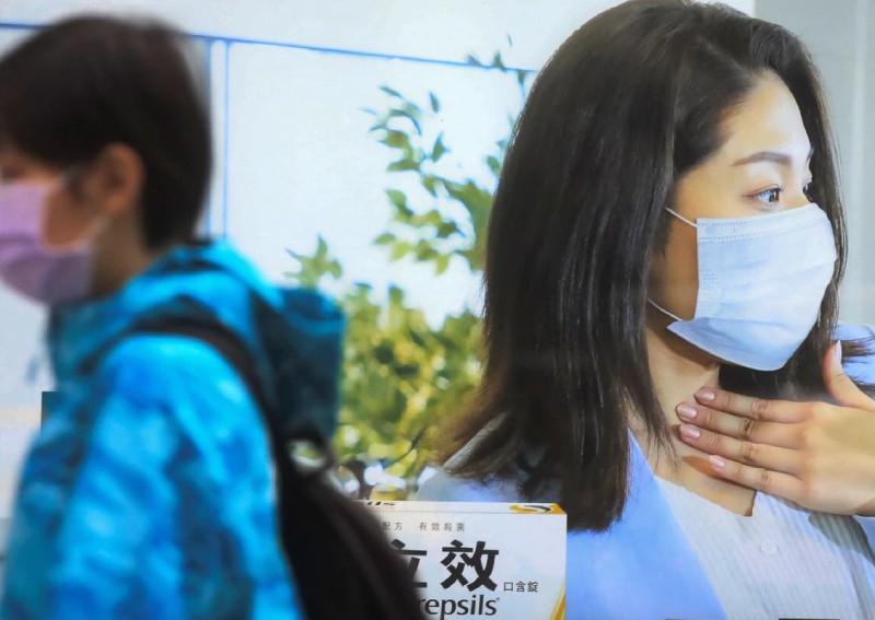 Taiwan urges vigilance after first Omicron coronavirus cases