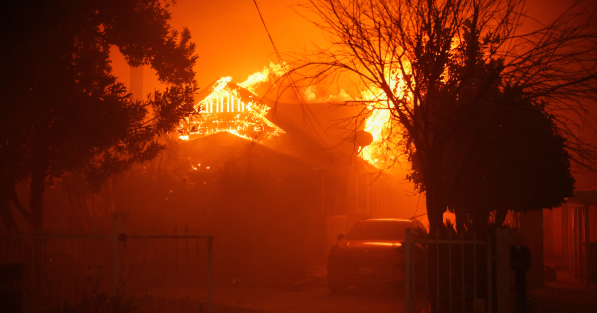 Los Angeles surrounded by out-of-control wildfires; at least 5 dead