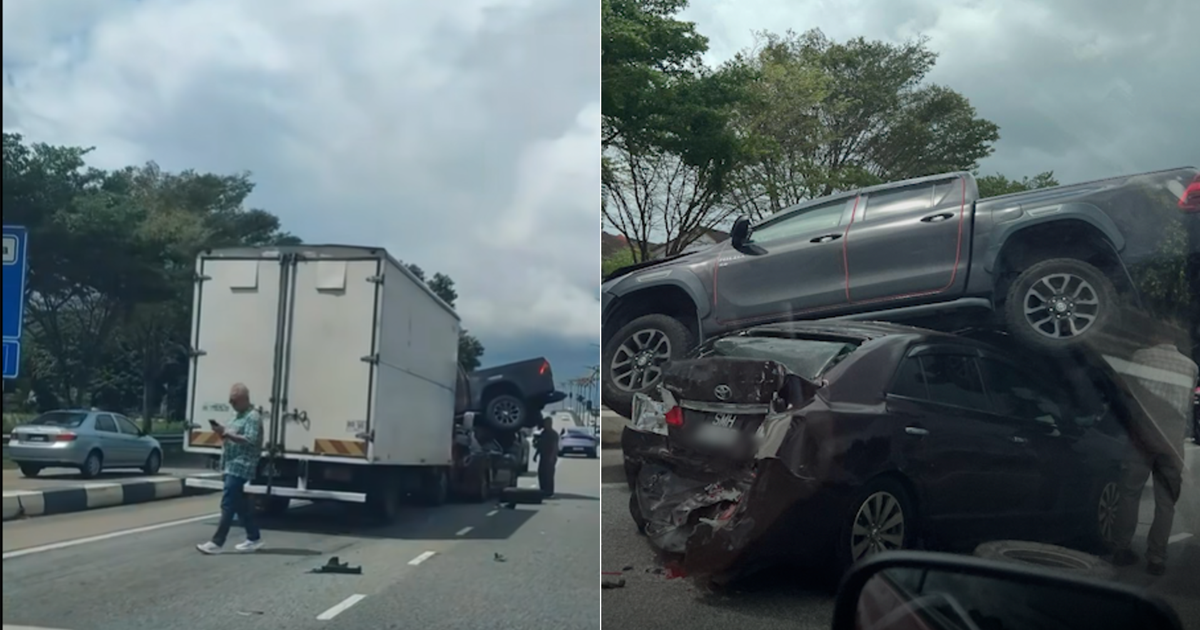 singapore Lorry smashes into vehicles at JB red light, leaving truck atop Singapore car