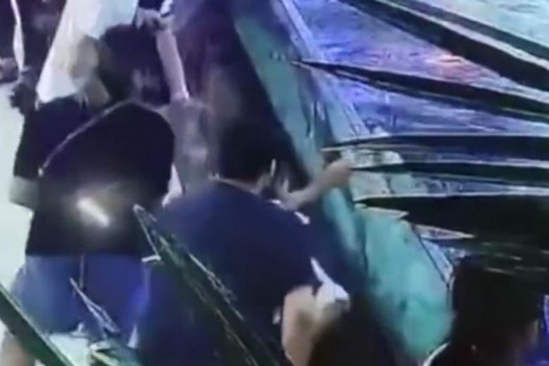 Shark attack in China mall aquarium leaves six-year-old girl with mangled hand