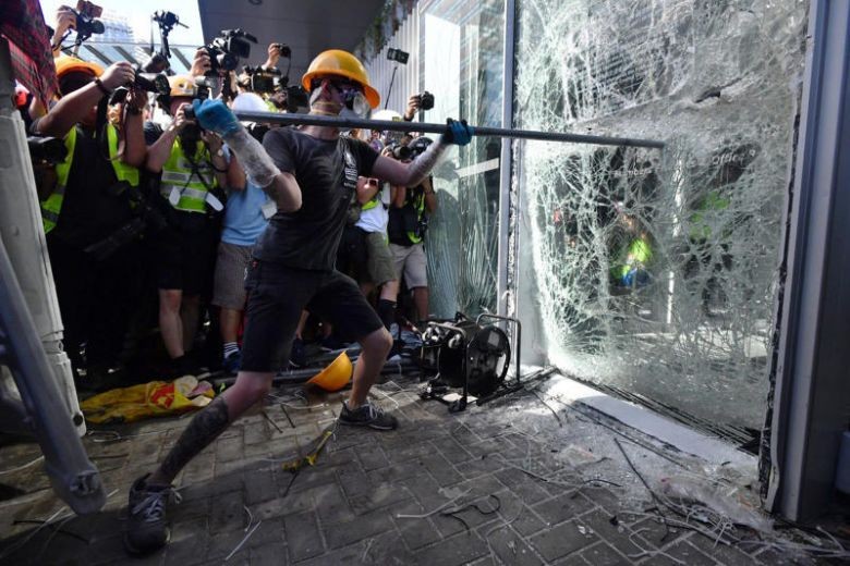 Hong Kong protesters smash Legco building glass door in fresh demonstrations, July 1 march rerouted