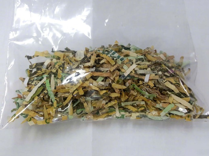 Korean woman pieces together $600 in shredded banknotes, wins respect of the internet