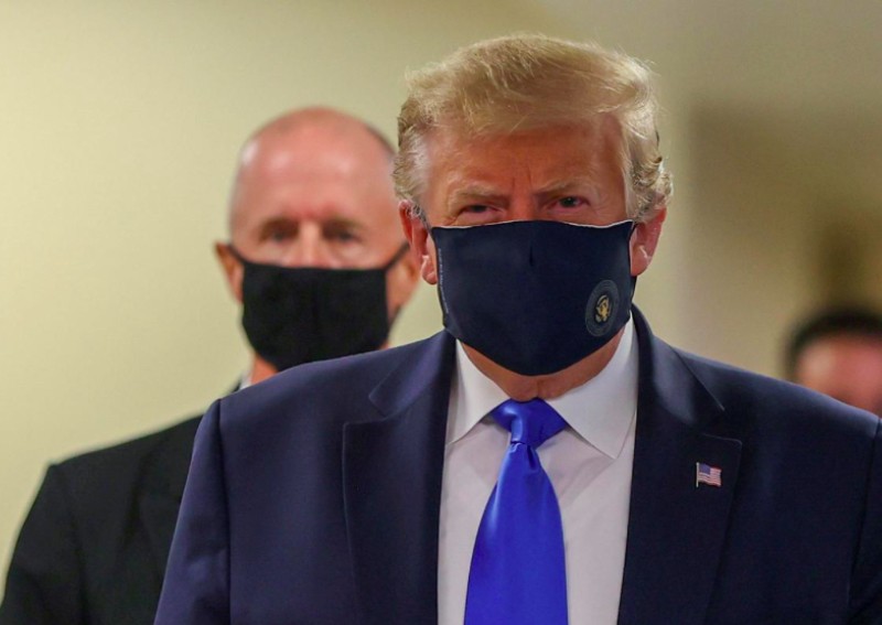 Trump shifts rhetoric, warns virus is getting worse and urges wearing of masks