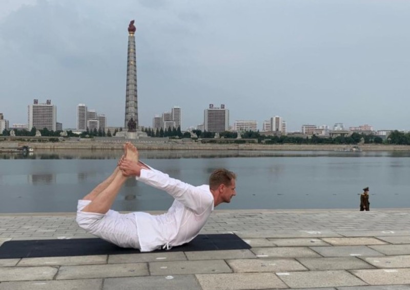 Handstands in North Korea: Swedish ambassador takes yoga to streets amid coronavirus lockdown
