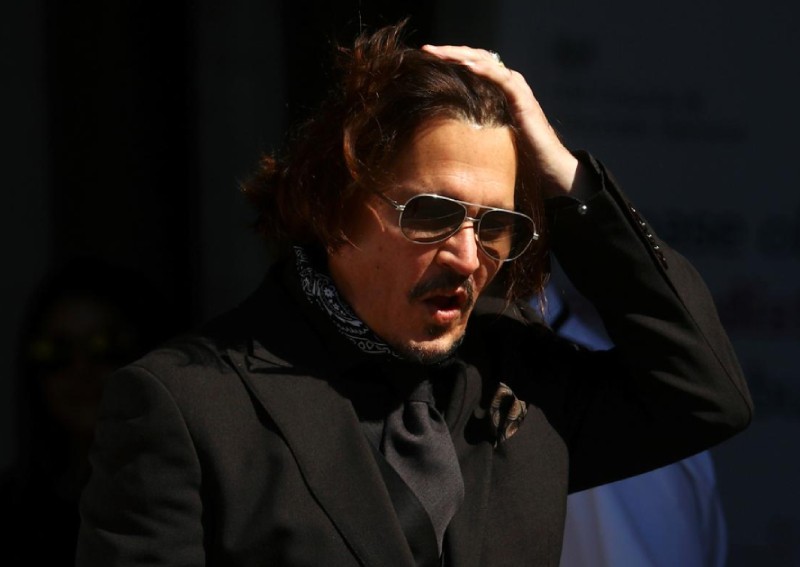 Depp threw bottles 'like grenades' in fight where he severed finger, Heard tells UK court