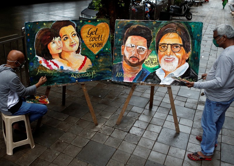 Fans in India pray for Bollywood's Bachchans to recover from Covid-19