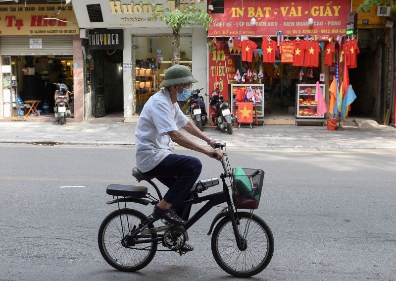 Vietnam to expand movement curbs as coronavirus cases hit record high