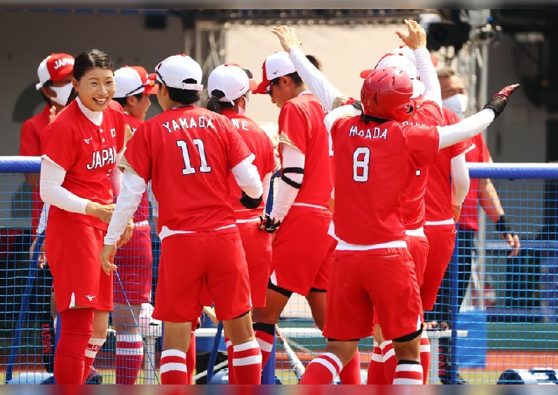 Japan win softball opener as Games 'of hope' begin