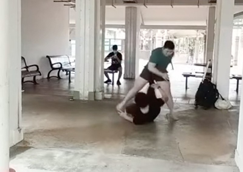 'Wrestling champion' Kurt Tay accepts stranger's challenge to fight at void deck, now under police probe