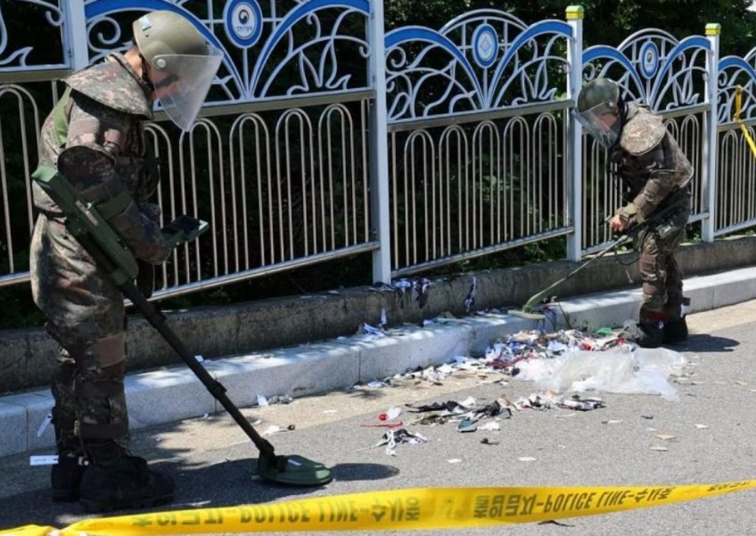 North Korea's trash-filled balloons disrupt flights in Seoul, cause rooftop fire