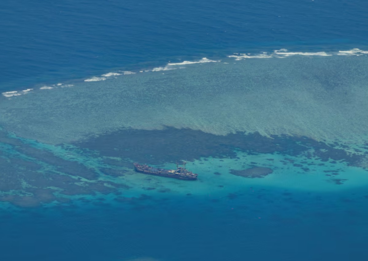 Philippines says to still assert South China Sea rights after resupply deal with China