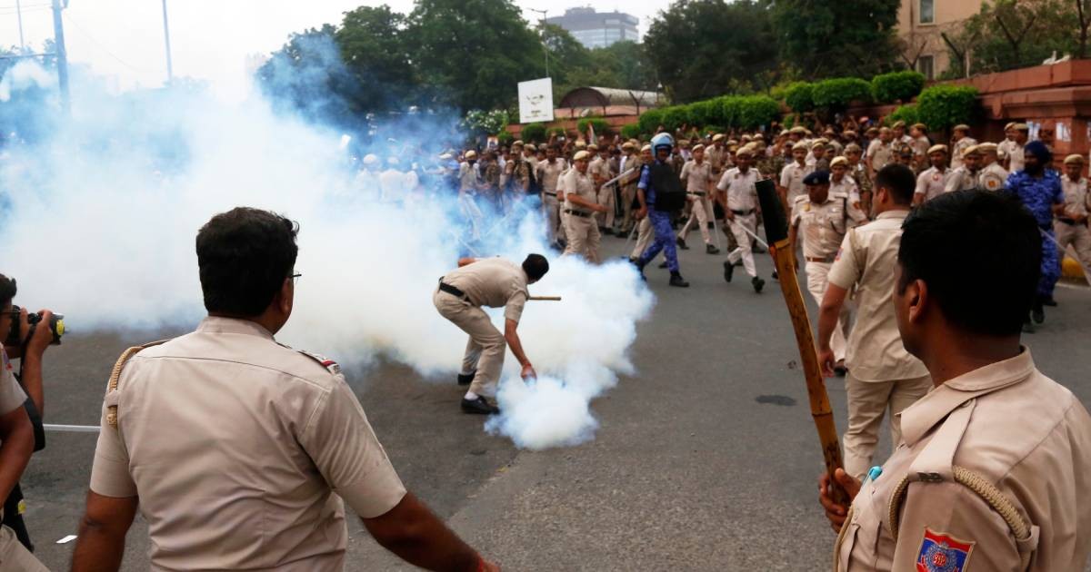 India police use tear gas to stop march on Parliament by Cockroach movement supporters