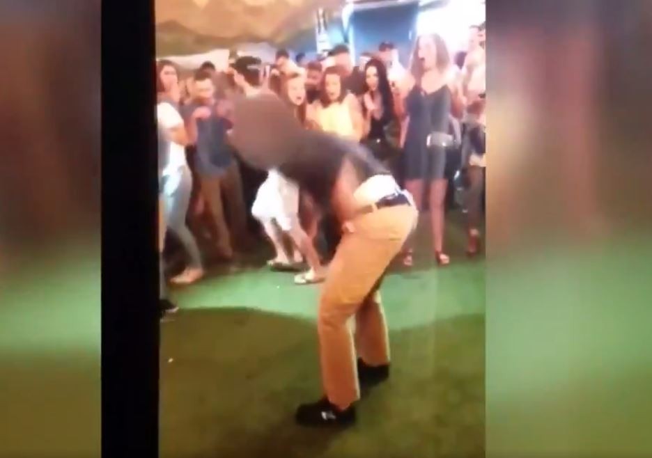 FBI agent's gun discharges during dance floor  backflip 