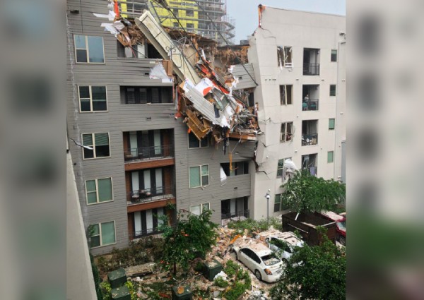 Crane collapses on Dallas apartment building, killing 1, injuring 6