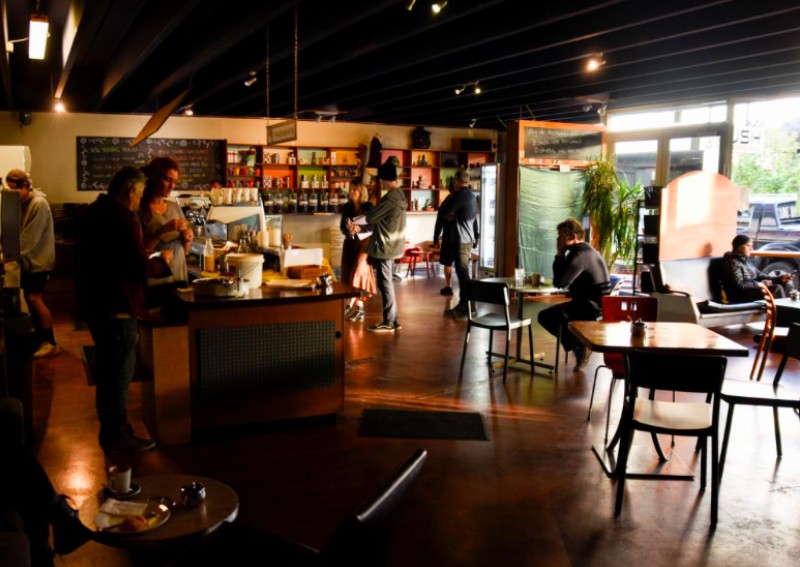 In New Zealand, shopping, parties and big hugs mark start of 'Covid-free' life