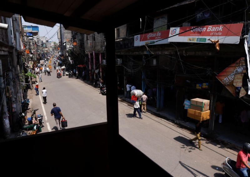 India to give adults free Covid-19 shots after bungled vaccine rollout, soaring deaths