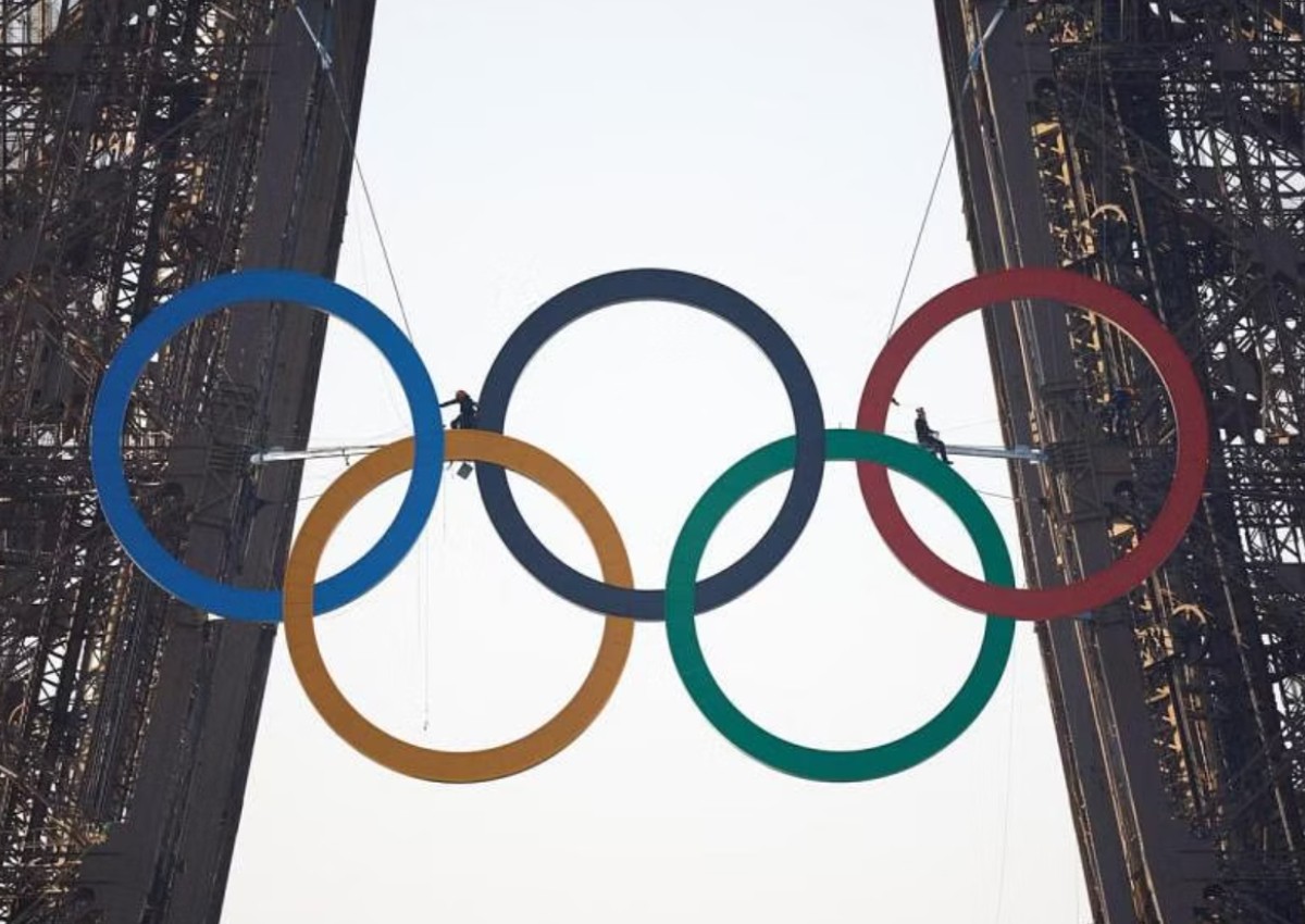 Olympic rings displayed on Eiffel Tower 50 days before Paris 2024 Games